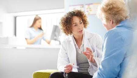Image of a doctor having a discussion with a patient