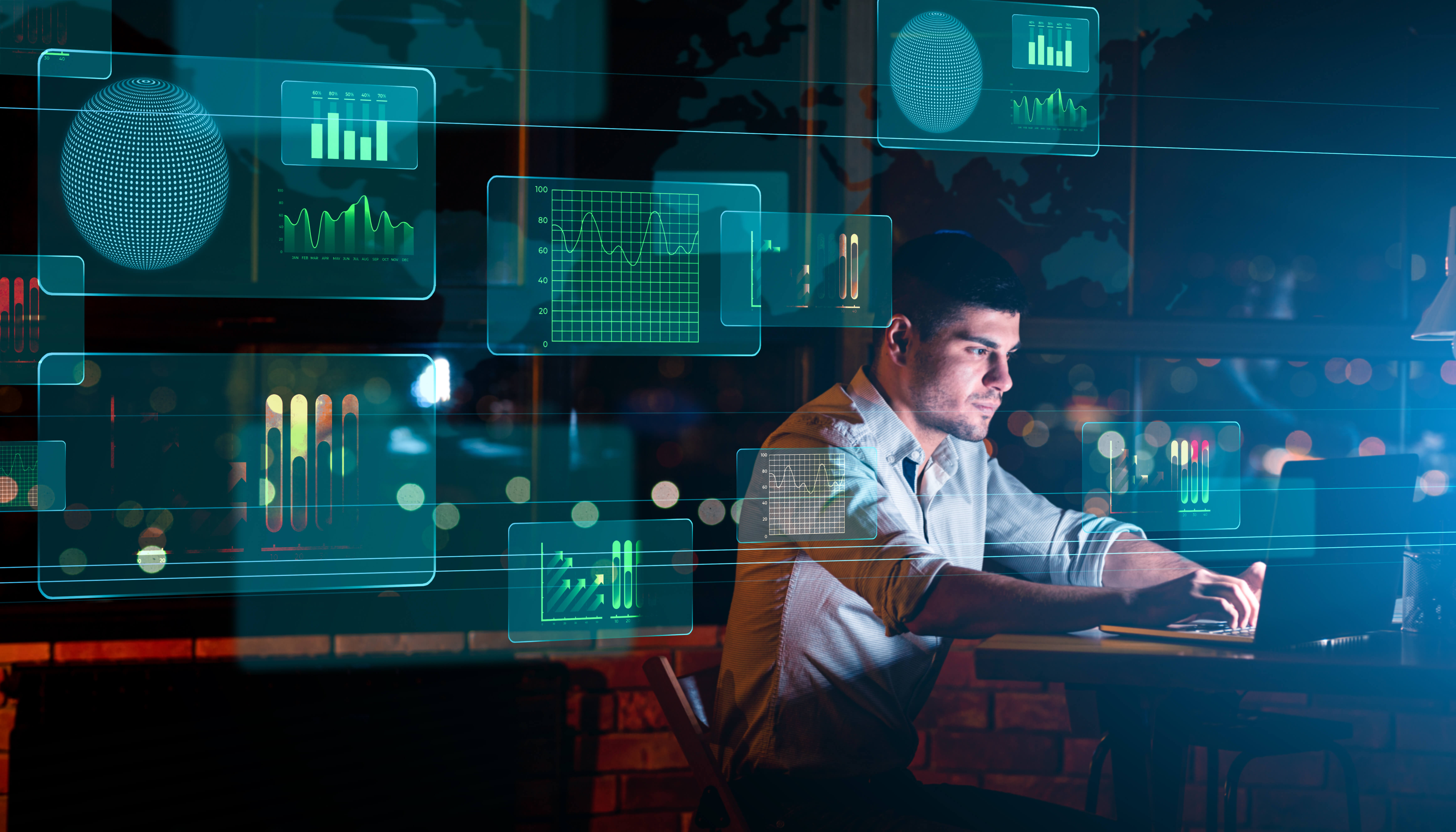 A professional at the Department of Defense sits at a computer in a dark operation center highlighting real time analytics, decision-making, and mission critical intellgience