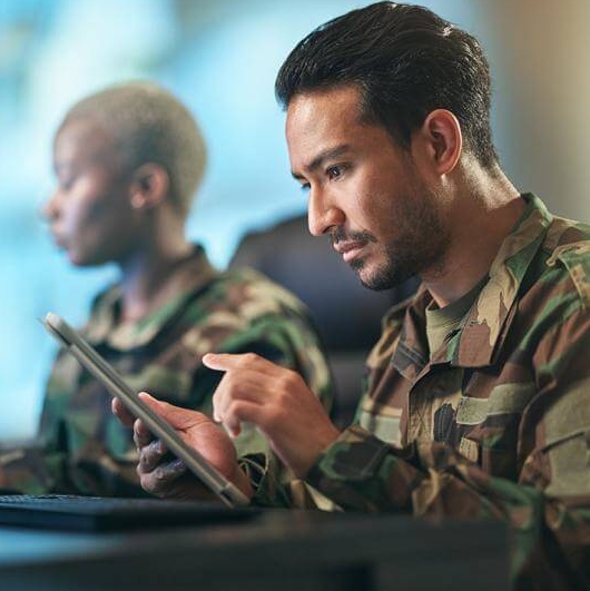 soldier working at computer station