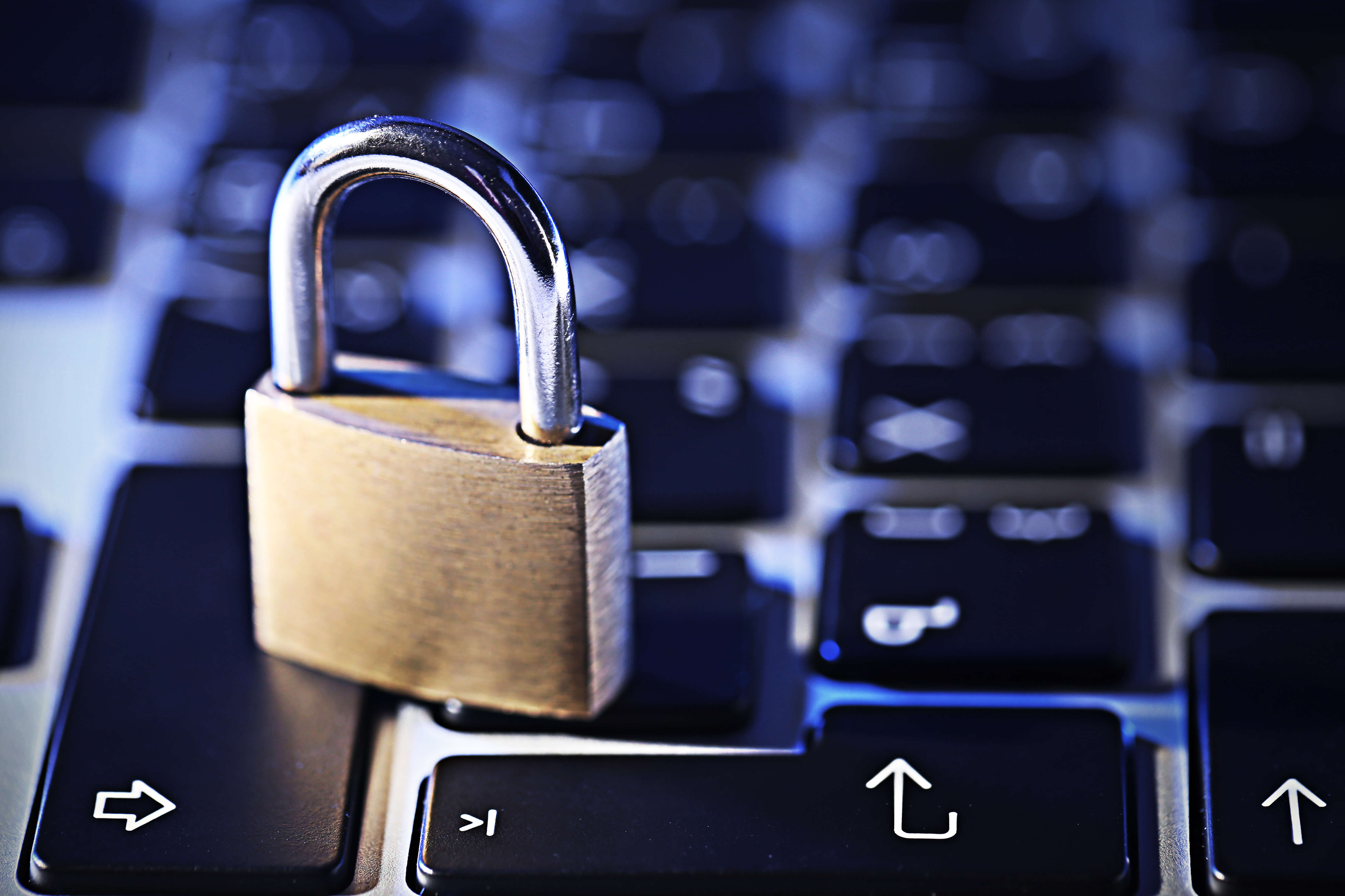  Padlock on a computer keyboard symbolizing cybersecurity.