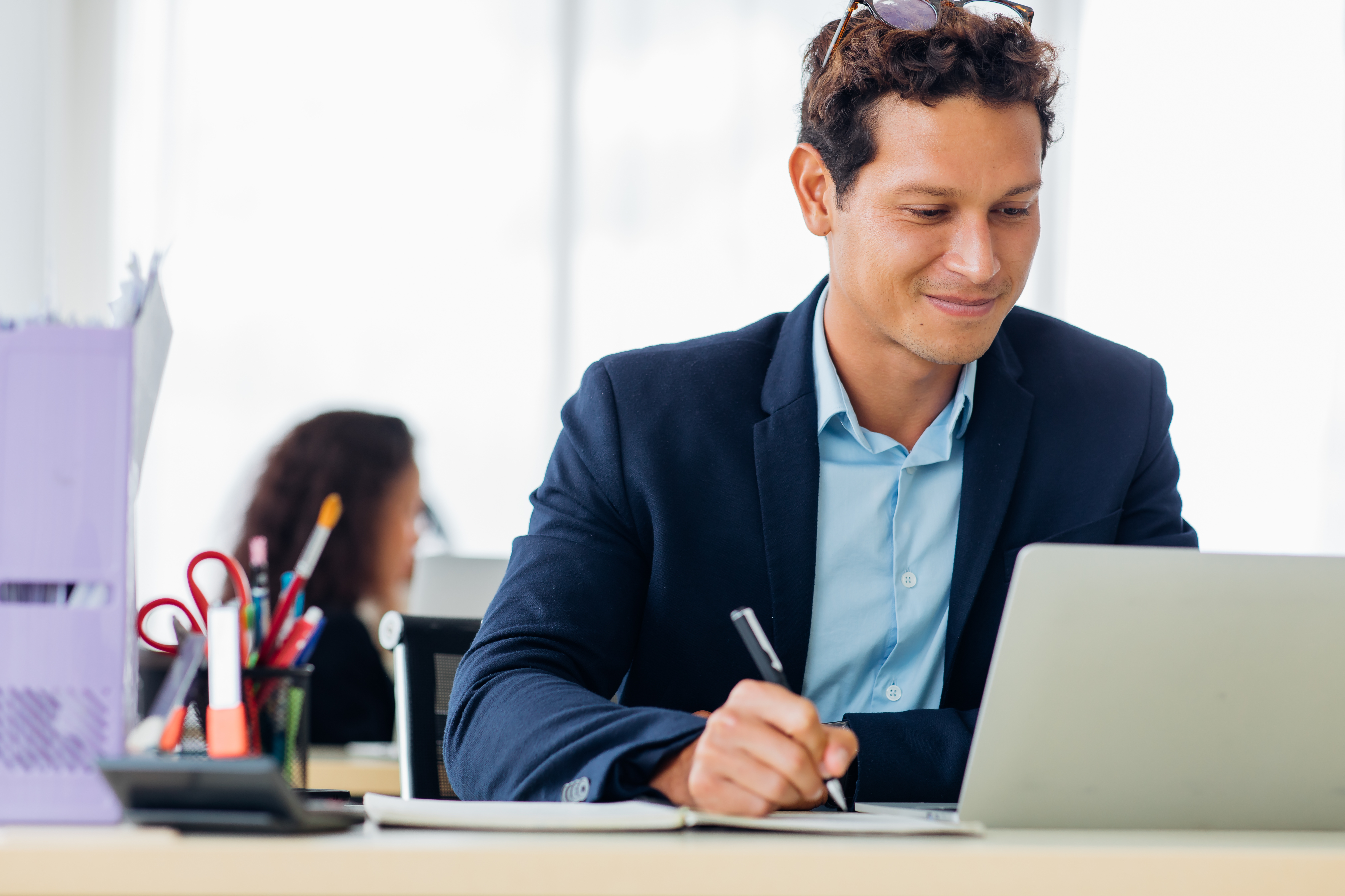 Business man entrepreneur working on laptop computer.