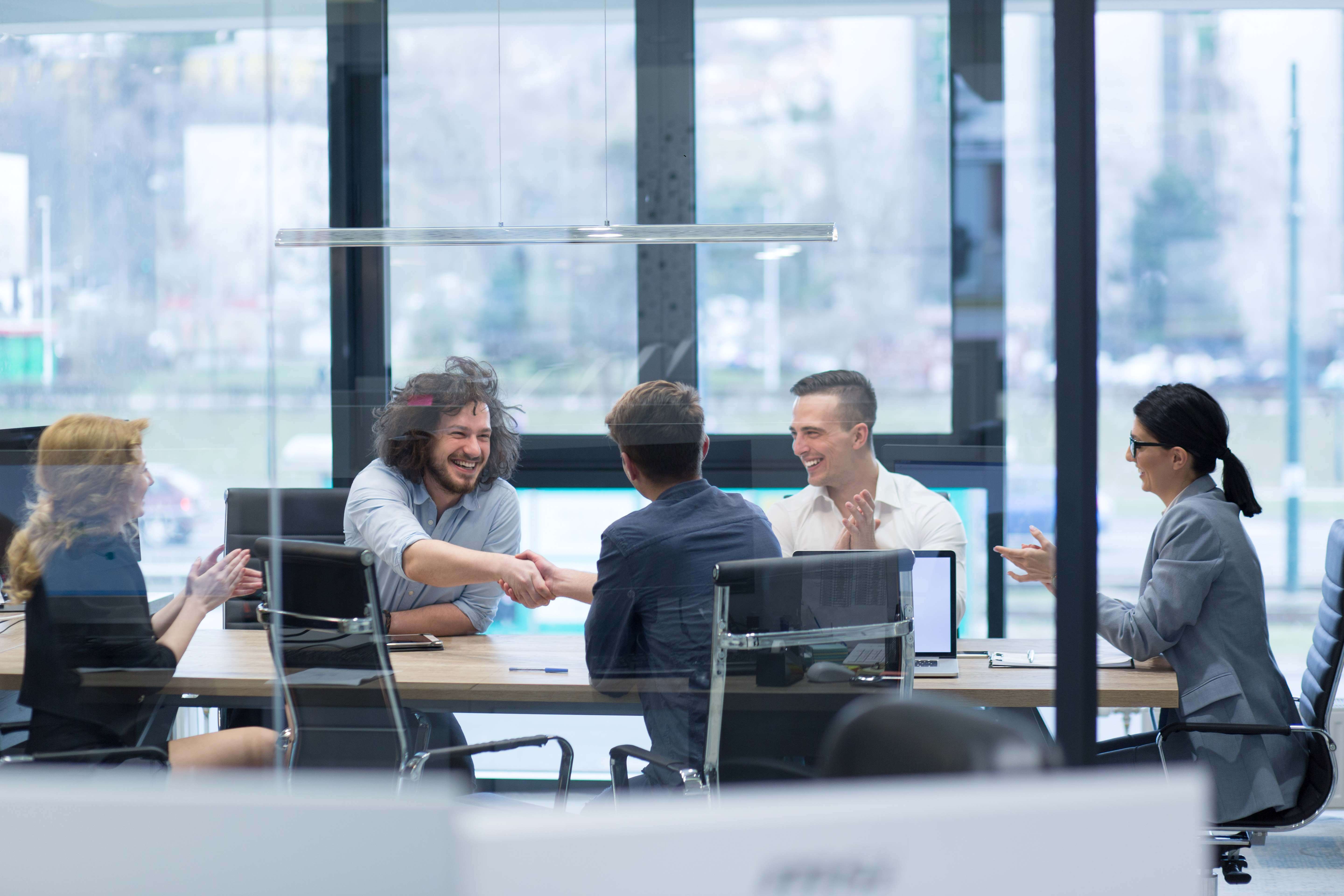 Group of people working together at an office 