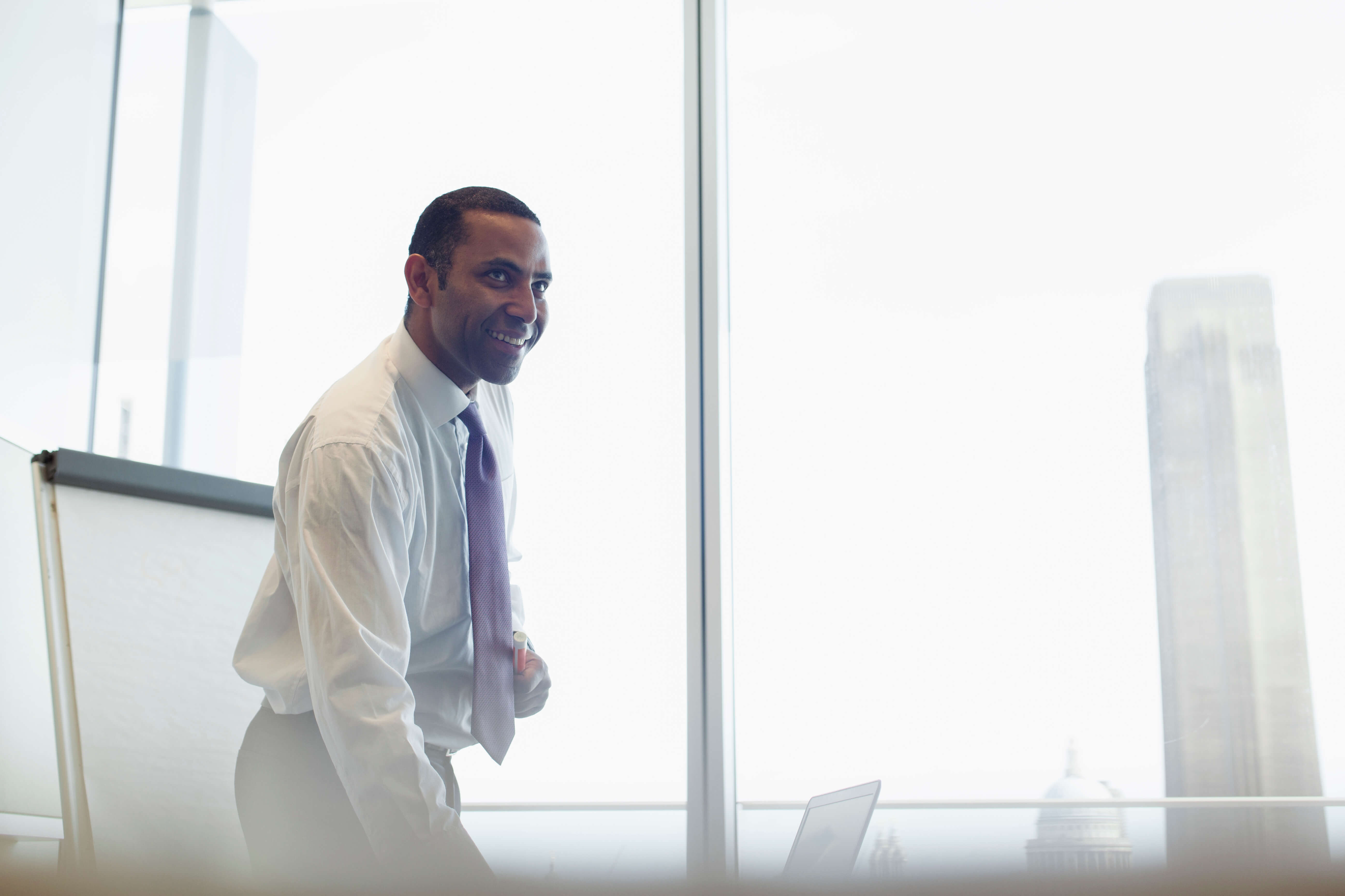 Businessman preparing for meeting in conference room