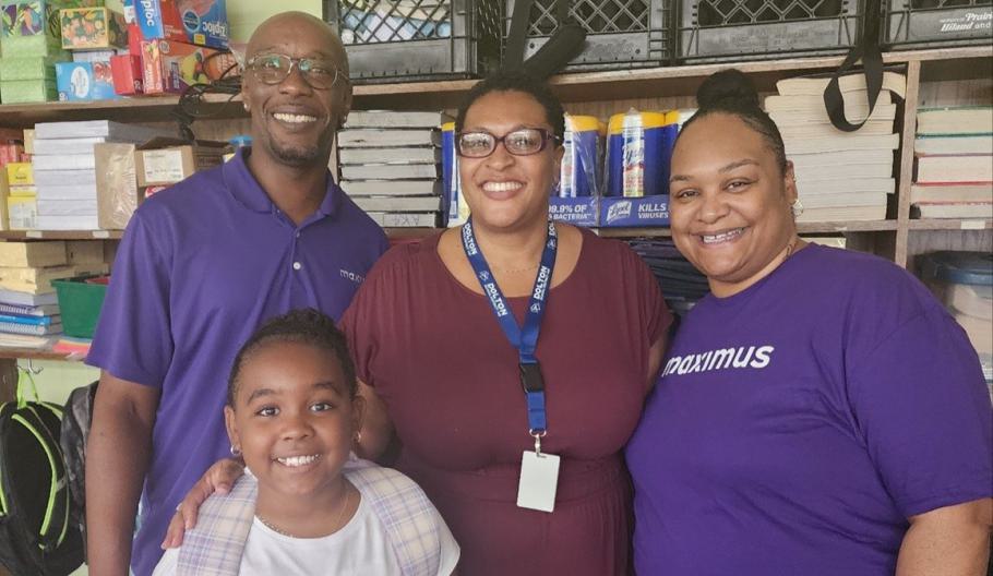 Maximus employees, Andre Price (left) and Dorian Hamilton (right), participate in the Adpot-A-Class program supporting local Chicago schools.