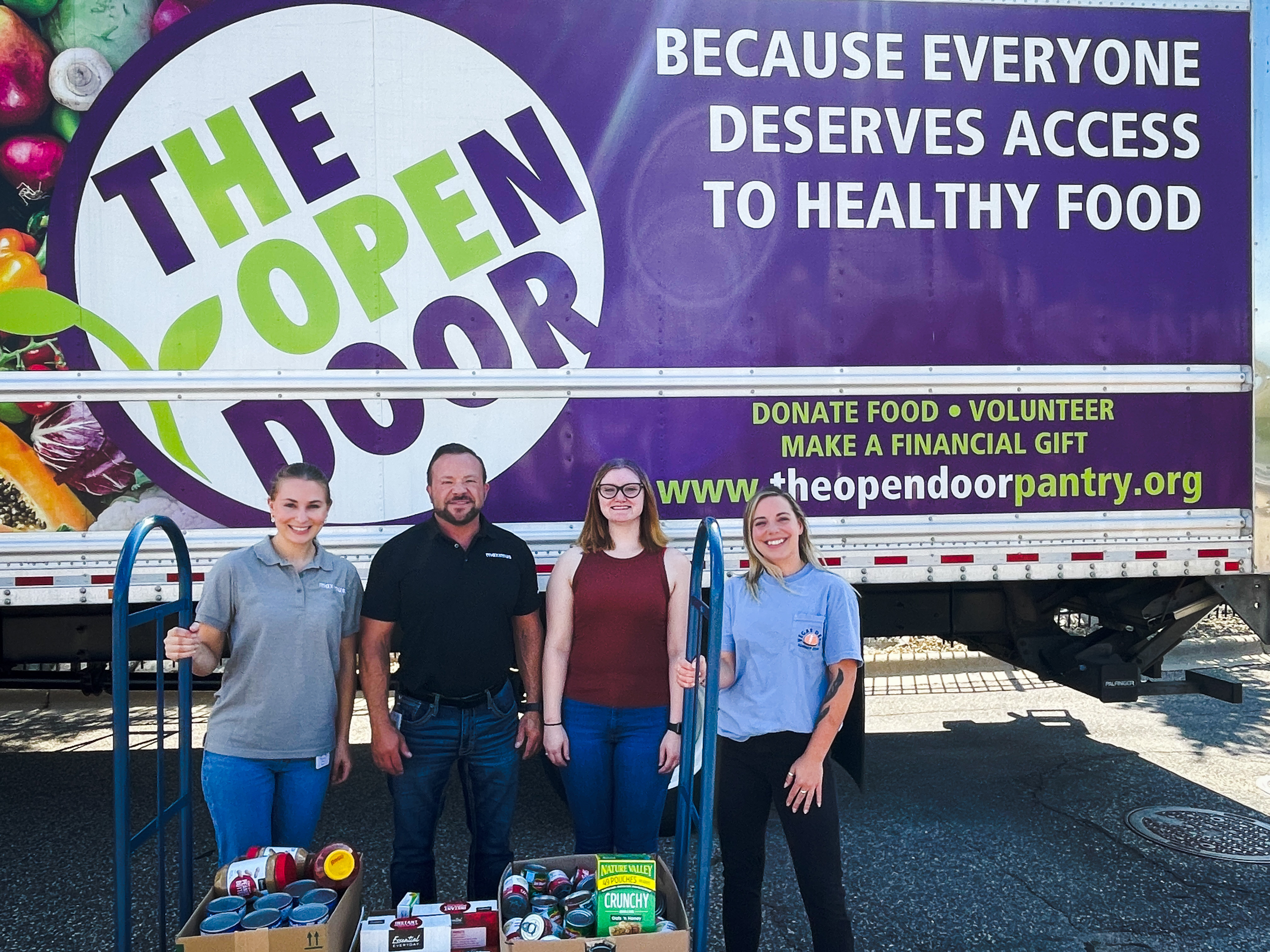 The corporate IT office in Eagan, MN, donates goods to The Open Door