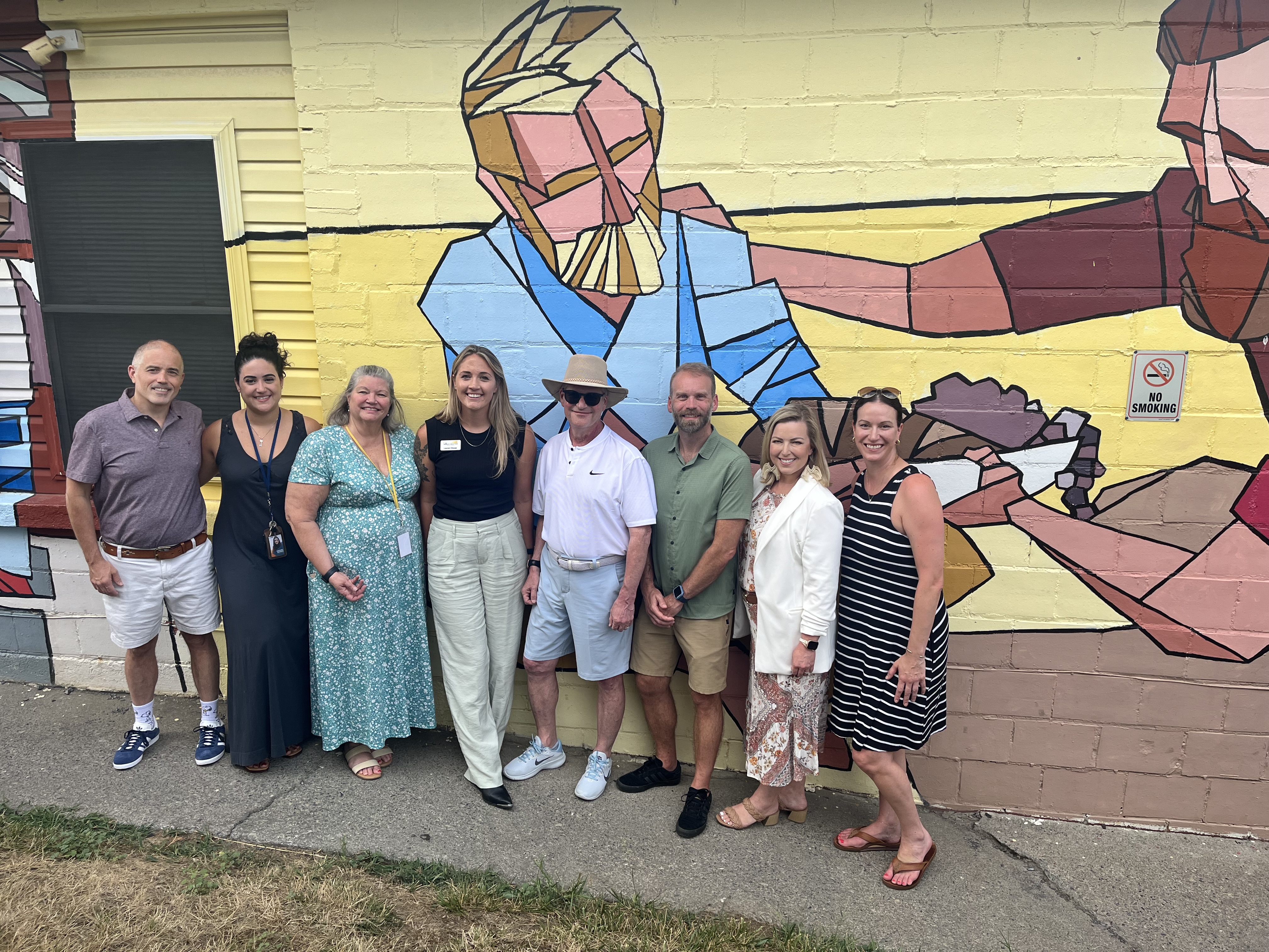 Christian Mollitor (Maximus, Lead Consultant) who nominated Winchester Rescue Mission for the Foundation grant; Rachel Rivera, WRM program manager; Deanna Kesler, WRM business director; Lauren Clouse, WRM executive director/CEO; and Maximus team members Ira Arbus, Eric Sibley, Allison Williams Wilson, and Stephanie Till Dannenberg. 