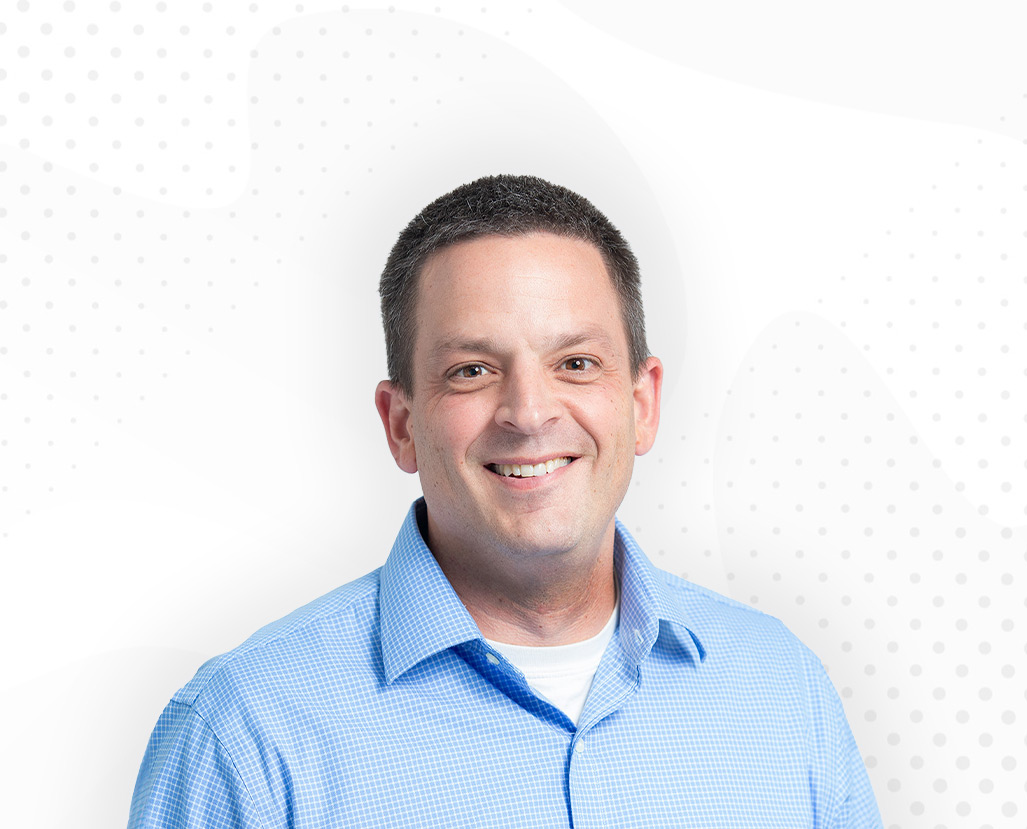Headshot of Maximus employee Mike Raker