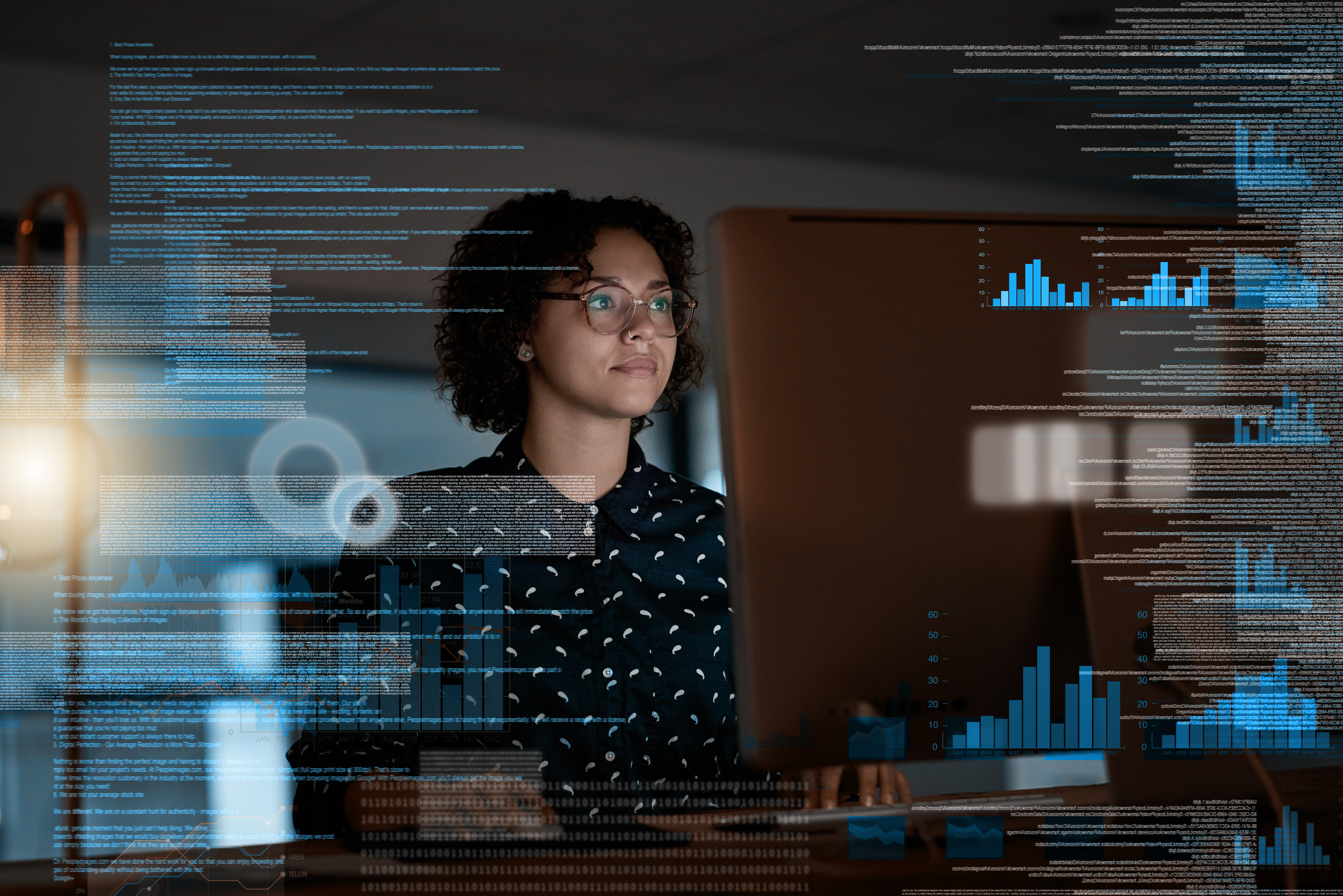 Technologist monitors an intelligent automation dashboard with blue graphs