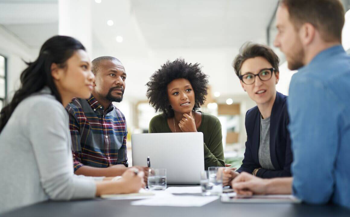 Shot of a team of colleagues having a meeting in a office