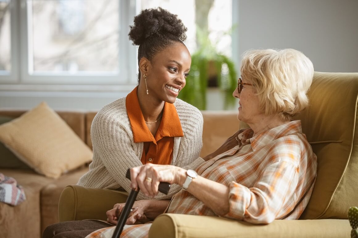 A professional conducts an in-home assessment of an older woman seeking admission to a Medicaid-certified nursing facility.