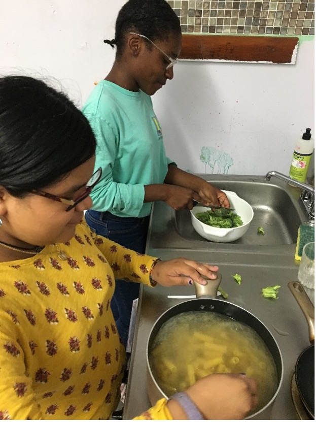 image of two girl cooking