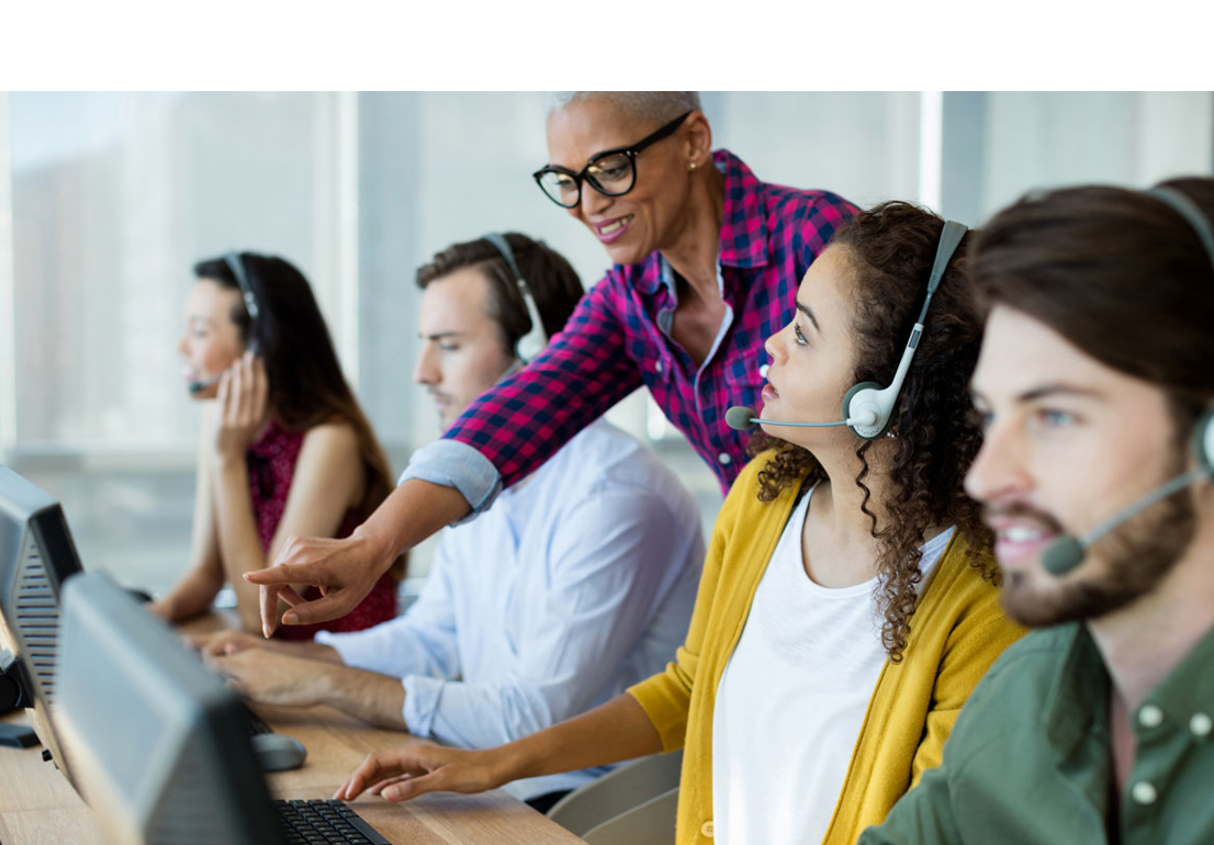 Image of people in a contact center working
