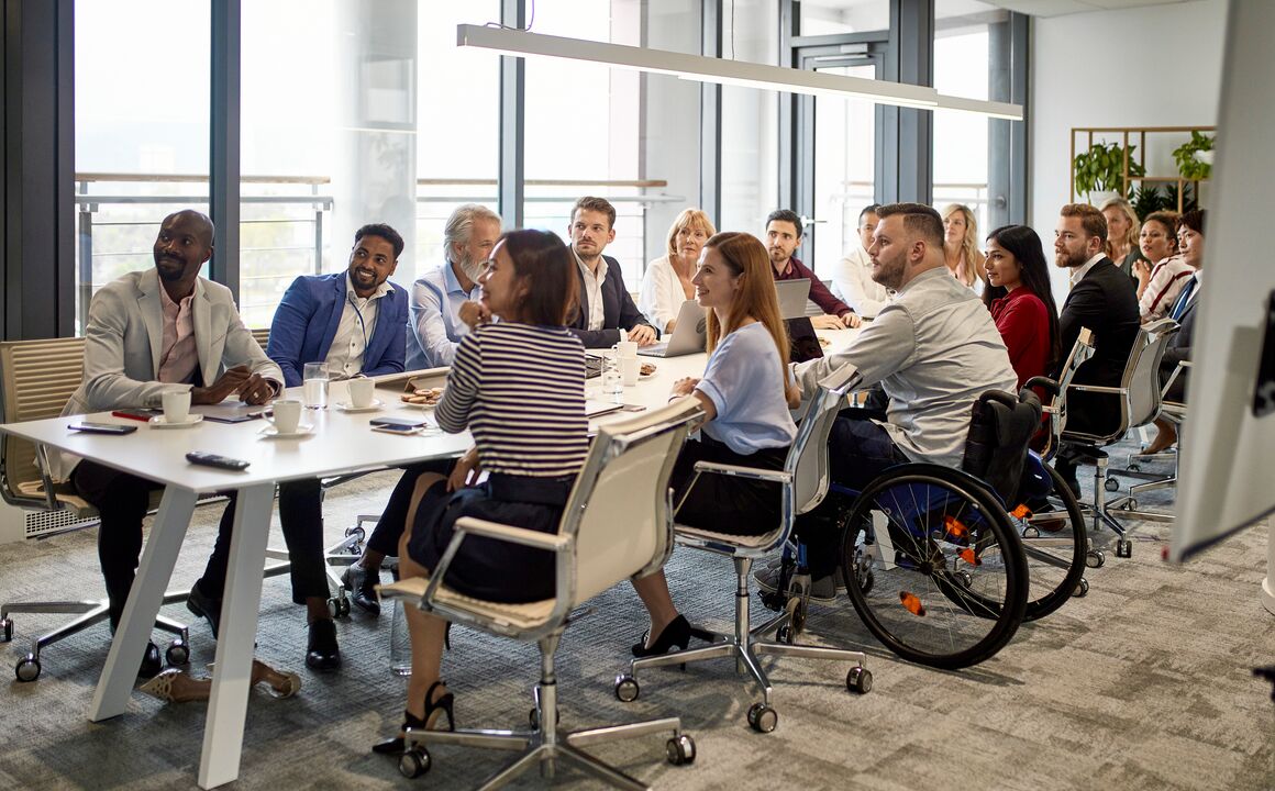 Image of a diverse group of professionals in a meeting