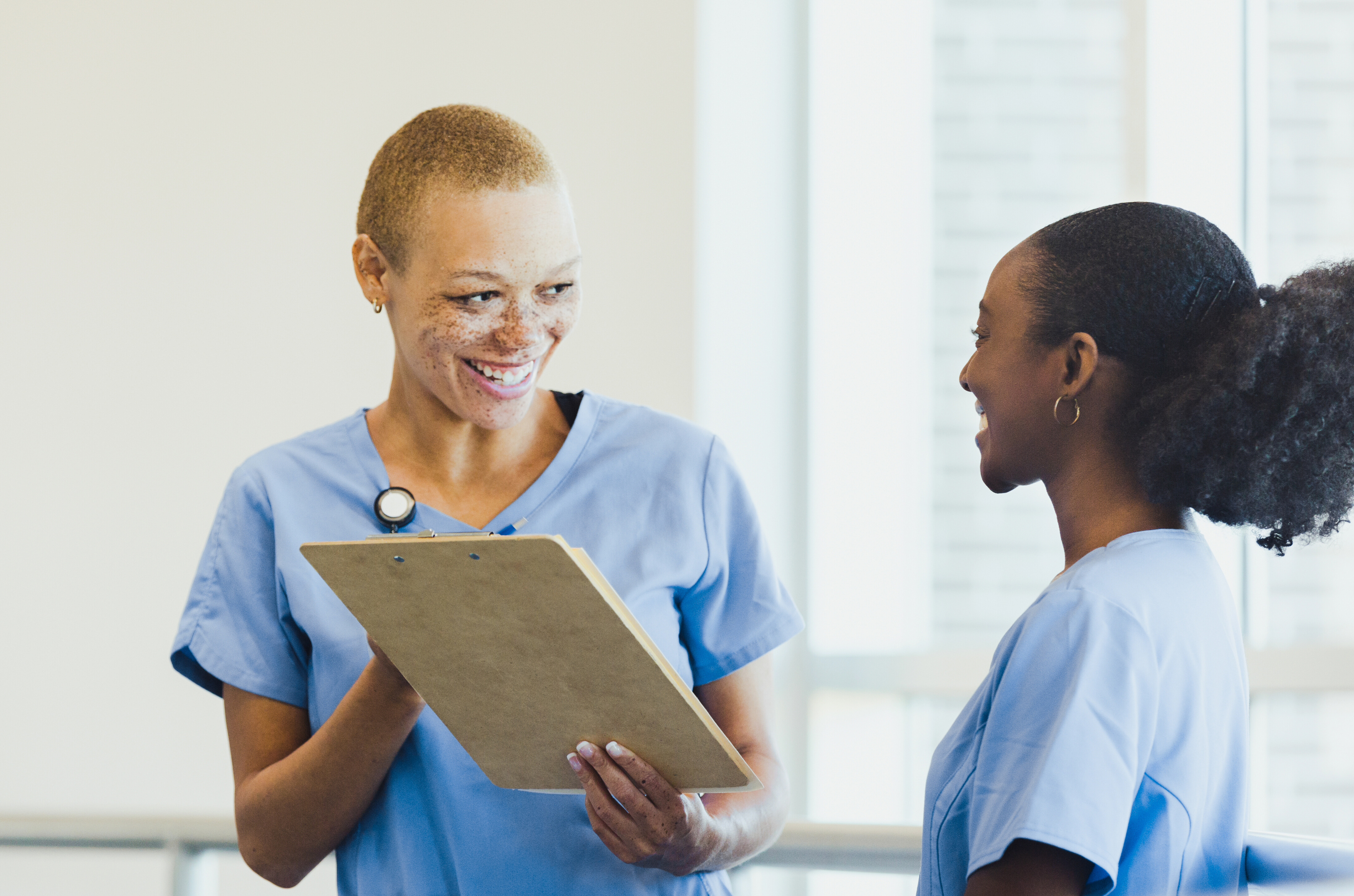 Image of a nurse talking to a patient