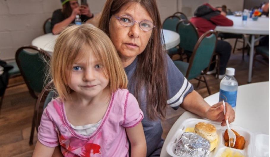 Image of a family eating a meal at Lexington Rescue Mission