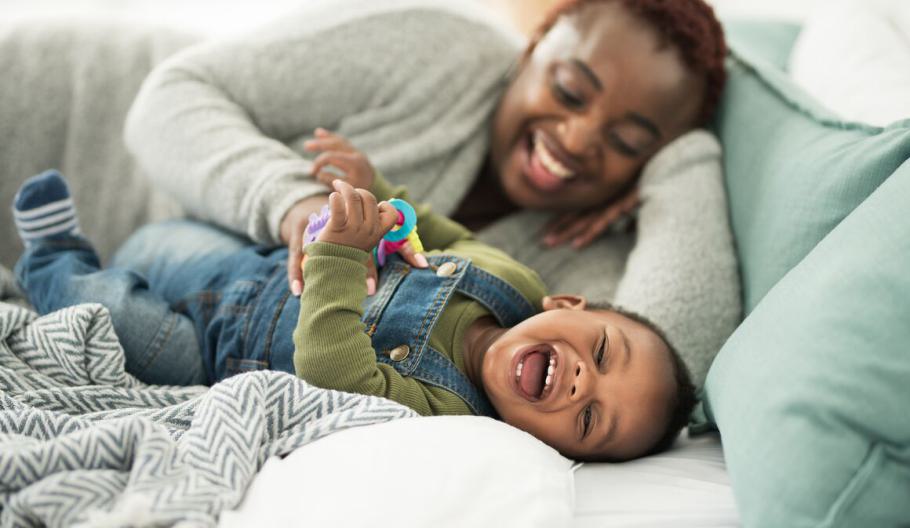 Image of a mother and child laughing