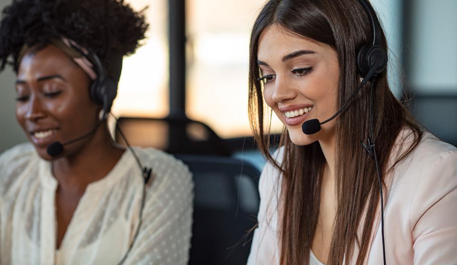 Image of a smiling female customer support operator. 
